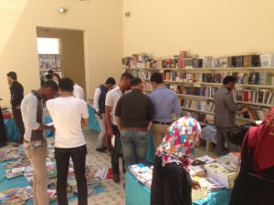Moja team and holding a signing ceremony for the novel "Frankenstein in Baghdad" by the Iraqi novelist Ahmed Saadawi