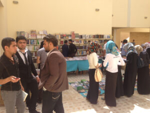 Moja team and holding a signing ceremony for the novel "Frankenstein in Baghdad" by the Iraqi novelist Ahmed Saadawi