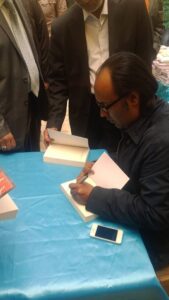 Moja team and holding a signing ceremony for the novel "Frankenstein in Baghdad" by the Iraqi novelist Ahmed Saadawi